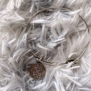 Alex and Ani puzzle piece bracelet, 2014